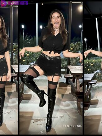 Queen Eugenia spreads her legs wearing thigh-high boots.