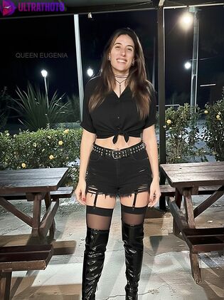 Queen Eugenia spreads her legs wearing thigh-high boots.